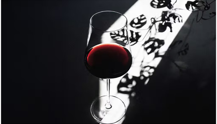 Why do I get headaches after drinking red wine?