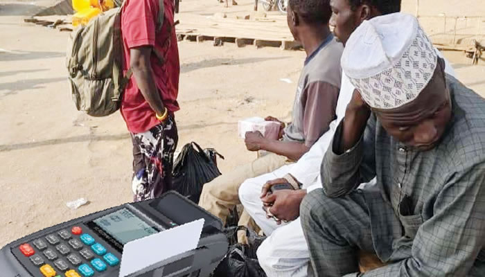 Tales of absurd: Bank customers groan over naira scarcity as currency hawkers swim in cash